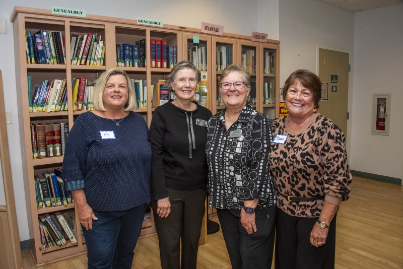 Friends of the Rehoboth Beach Public Library past presidents gather for a photo. Shown are (l-r) Kim Scott, Kathy Ackerman, Mary Costa and Marti Garrett.